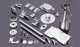 A collection of custom industrial sheet metal parts with various bends and forms
